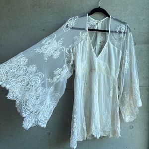 Jen’s Pirate Booty | stunning white lace, bell sleeve, short dress